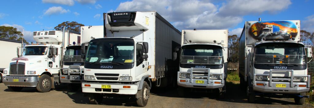 A fleet of trucks ready to deliver your message on the road.